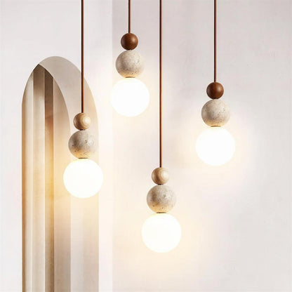 Travertine Pendant Light With Globe Shade And Stacked Spheres