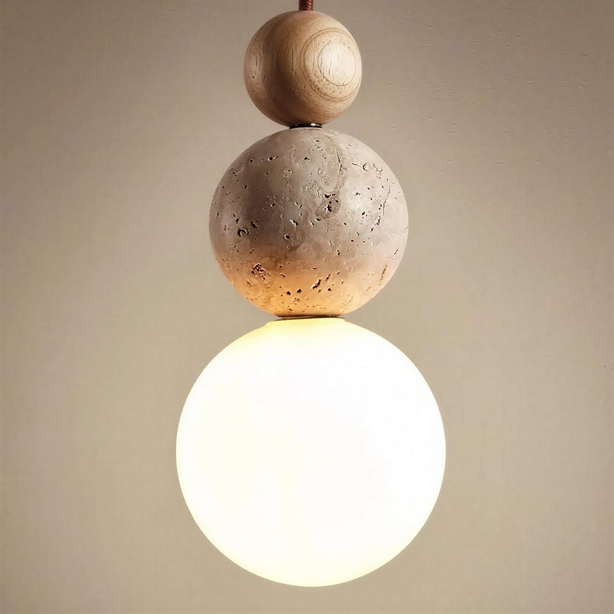 Travertine Pendant Light With Globe Shade And Stacked Spheres