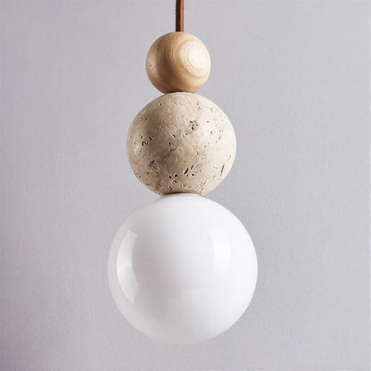 Travertine Pendant Light With Globe Shade And Stacked Spheres