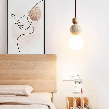 Travertine Pendant Light With Globe Shade And Stacked Spheres